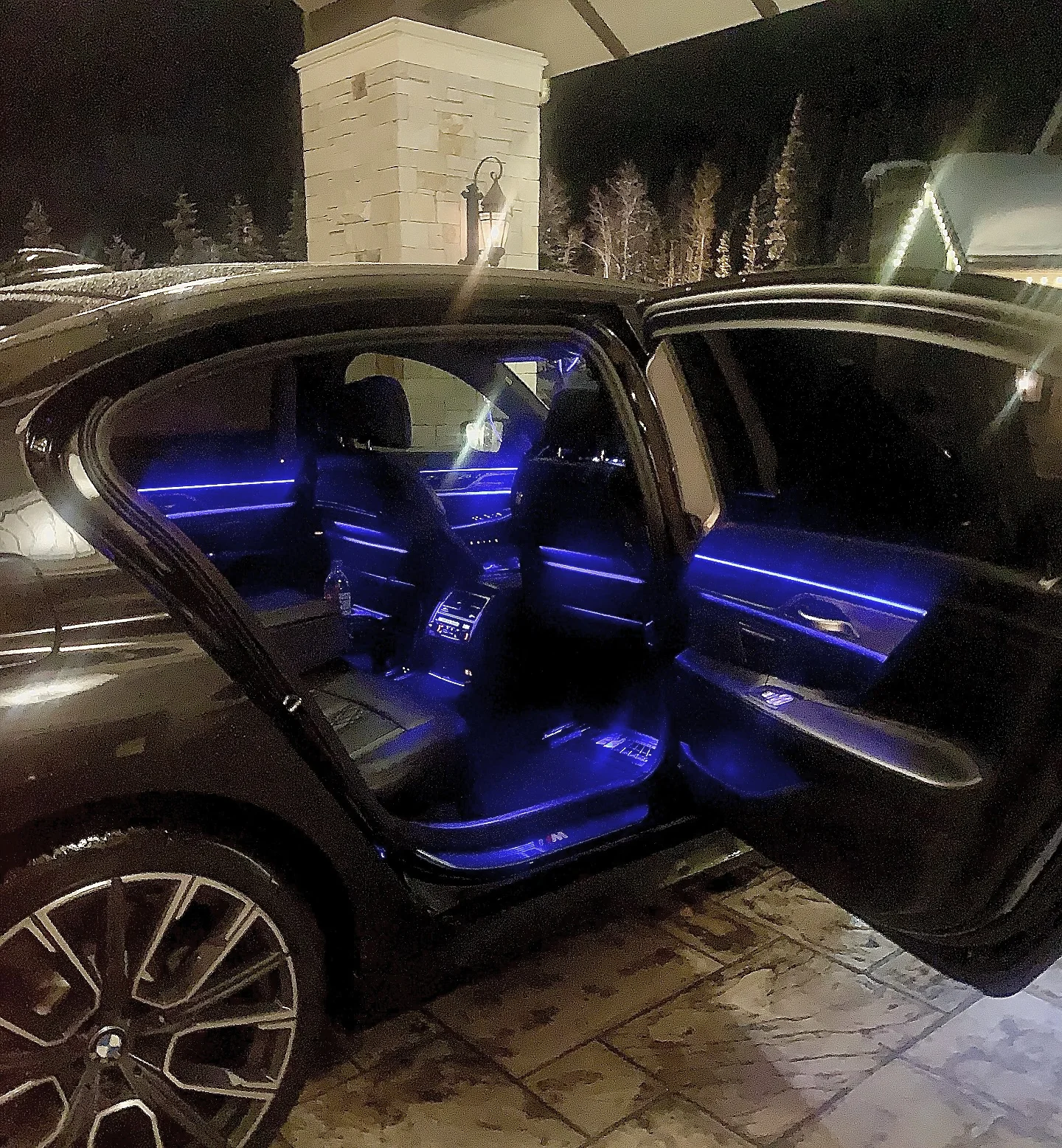 Warmly lit private black-car interior
